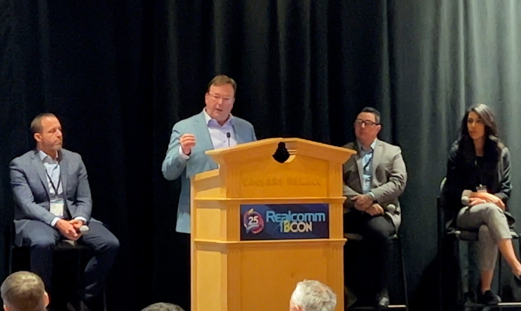 Scott Cochrane speaking at Realcomm IBcon 2023 Smart Building Integrator Summit